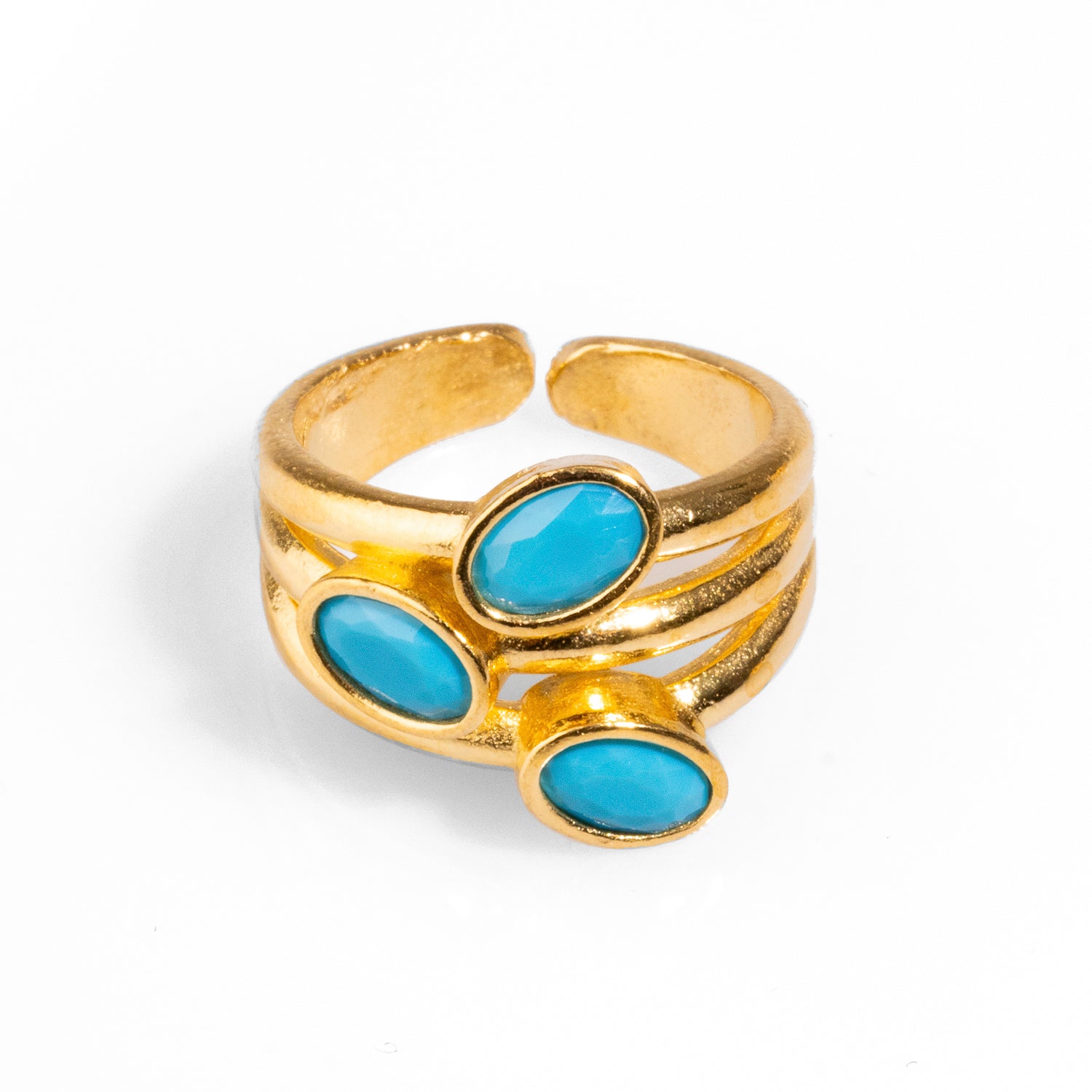 Elegant 24k gold-plated cocktail ring featuring three oval turquoise gemstones, adjustable for a comfortable and stylish fit.
