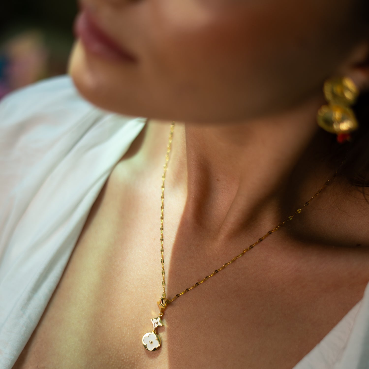 Triple charm celestial necklace with symbolic pendants
