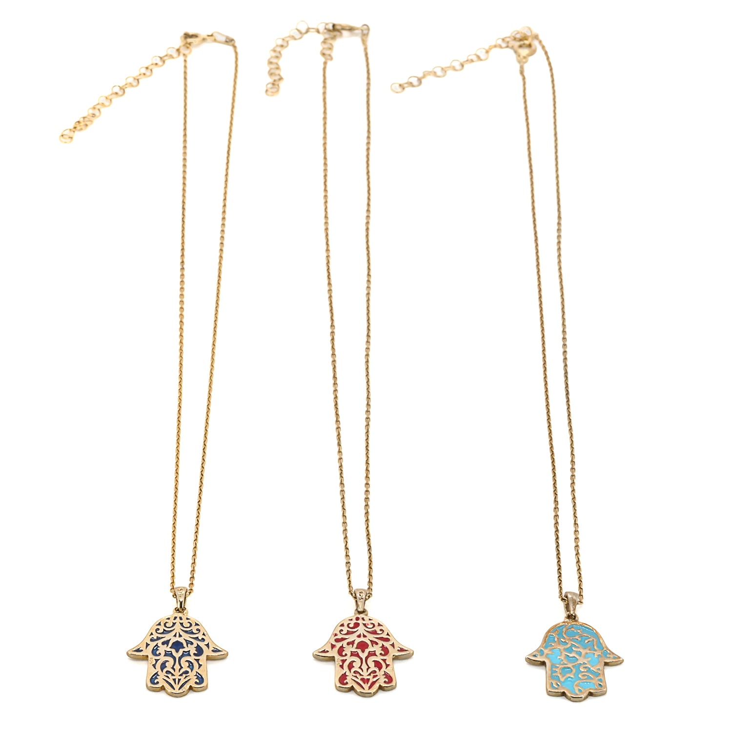 Discover the beauty and meaning of the Stay Positive Hamsa Necklace, a handmade talisman necklace with a vibrant hamsa pendant made of sterling silver and 18K gold plating, reminding you to stay positive.