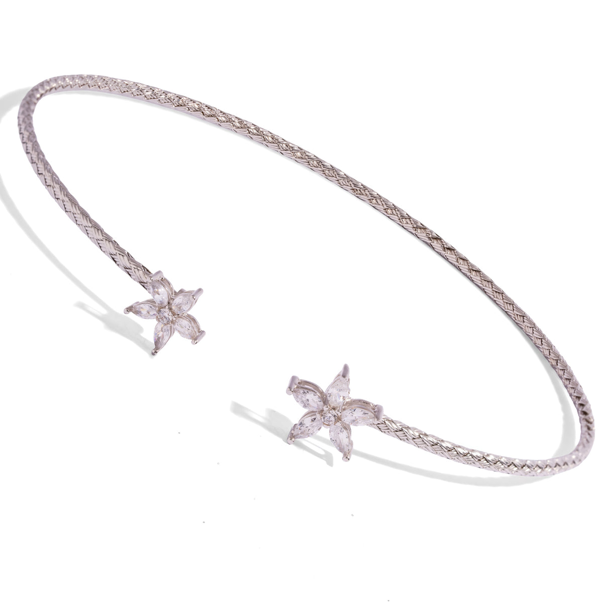 Open front sterling silver collar necklace with five petal cubic zirconia blossoms facing each other