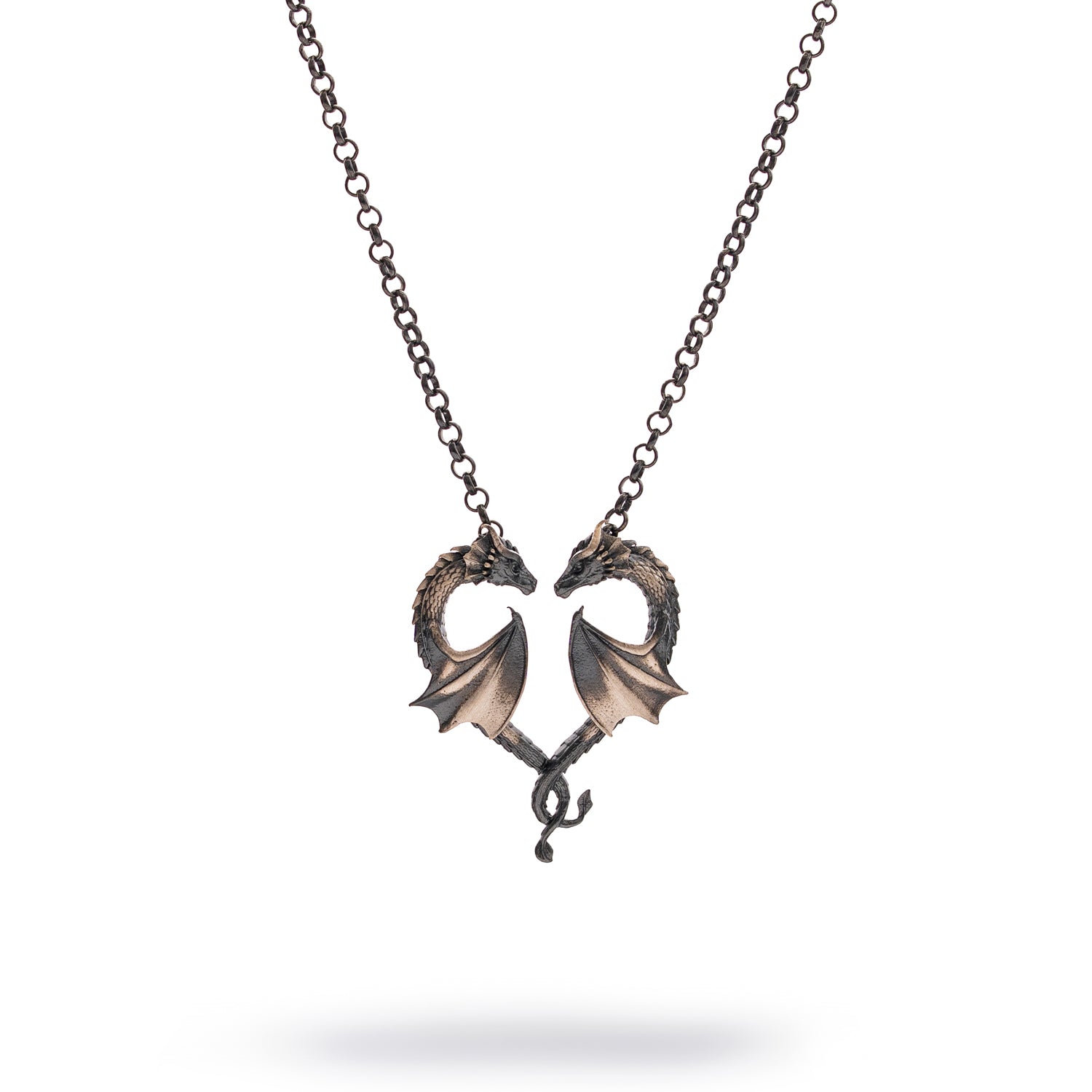 Sterling silver necklace with twin dragons forming a heart pendant, rhodium finish, intricate scales, black accents, strong chain, bold masculine style.