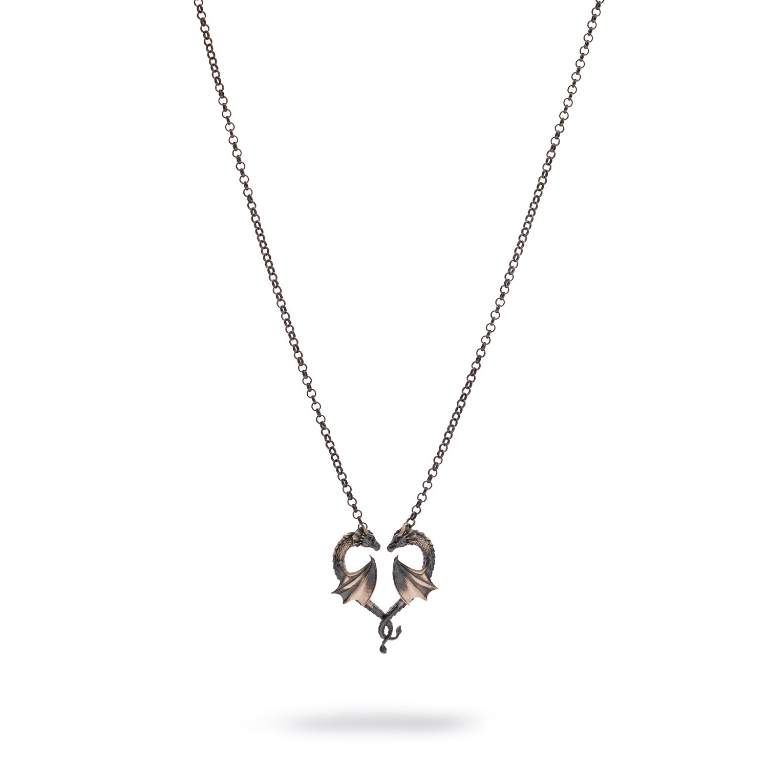 Sterling silver necklace with twin dragons forming a heart pendant, rhodium finish, intricate scales, black accents, bold masculine style.