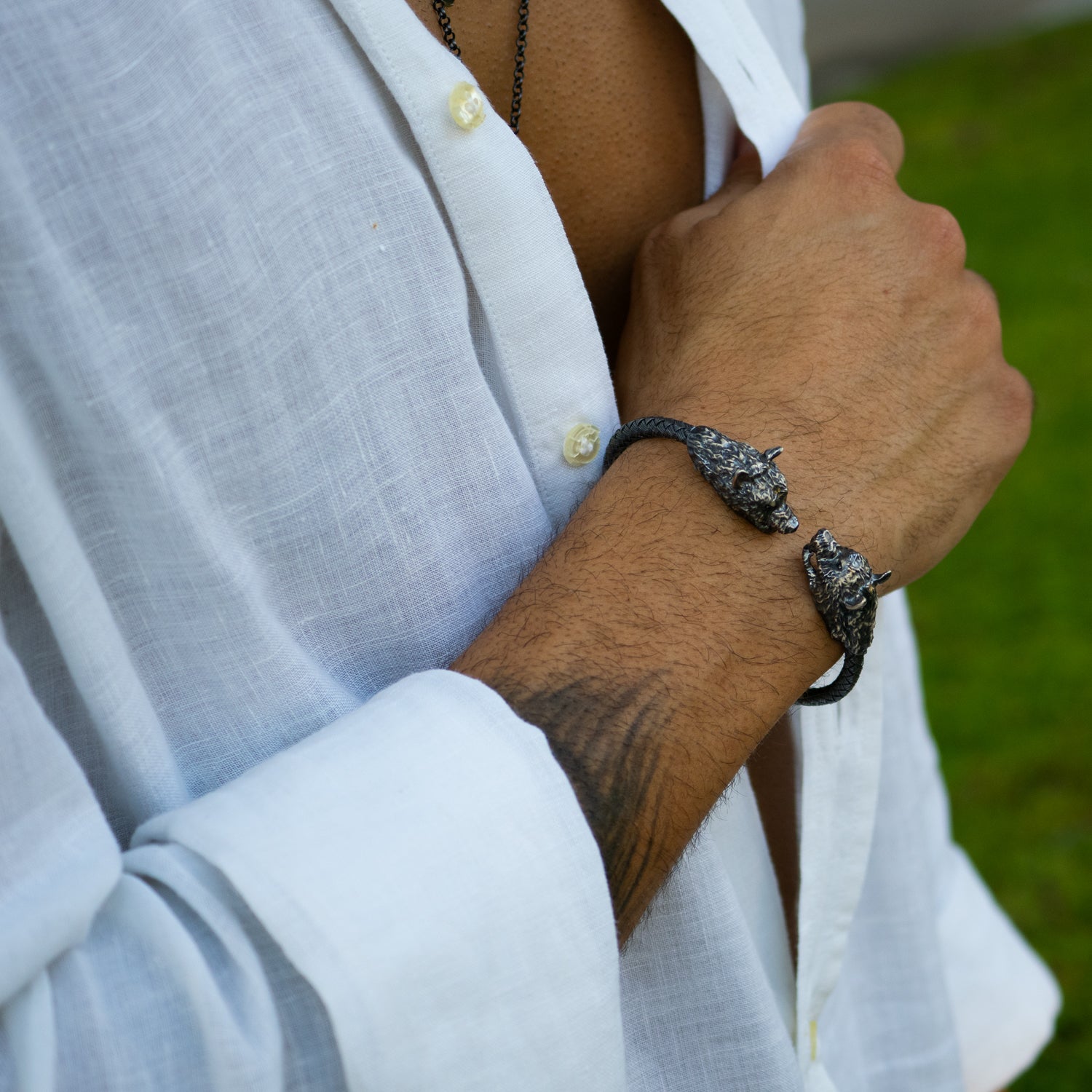 Twin wolf head bracelet in bold 925 sterling silver, handcrafted, rhodium finish, masculine style, unique detailing, adjustable size.