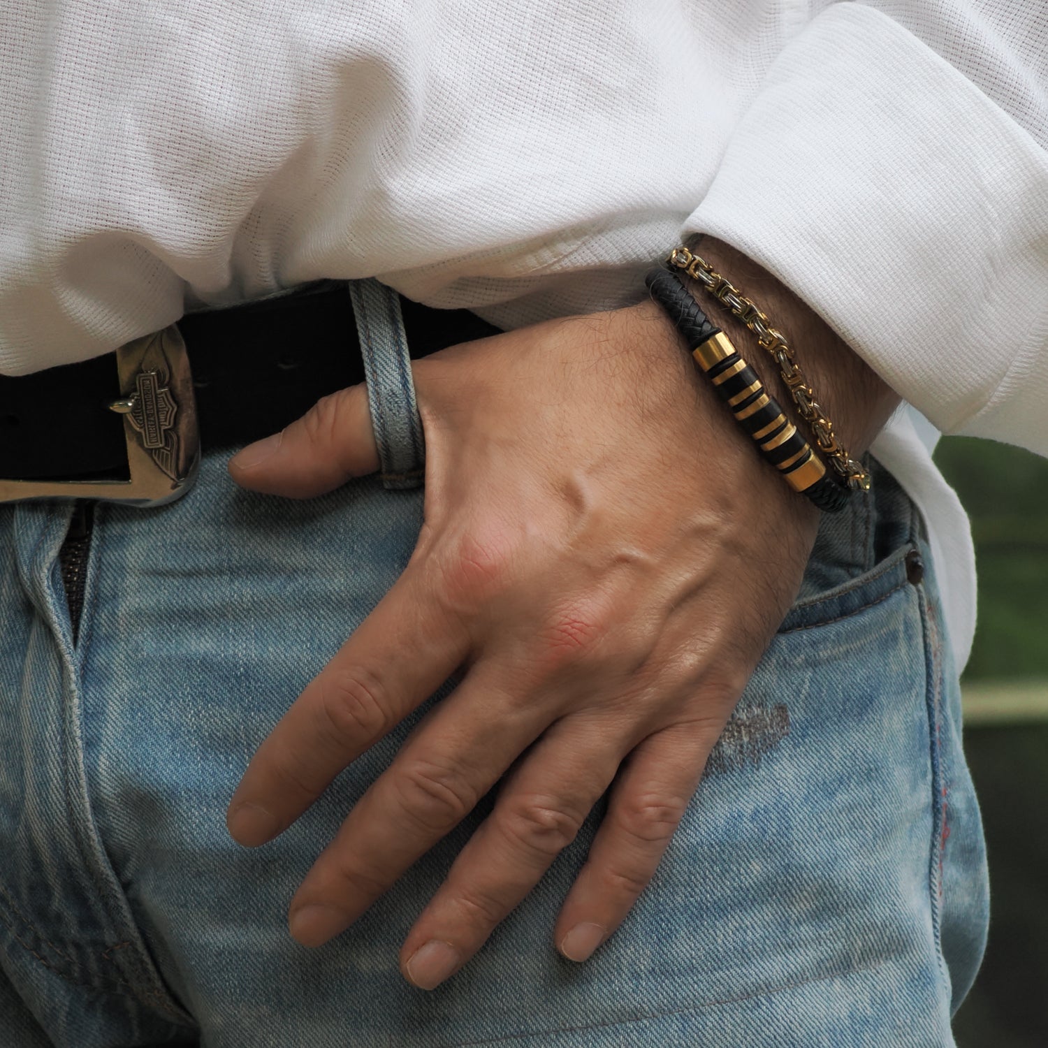 Bold men's bracelet with silver and gold stainless steel chain links, perfect for formal or casual wear.
