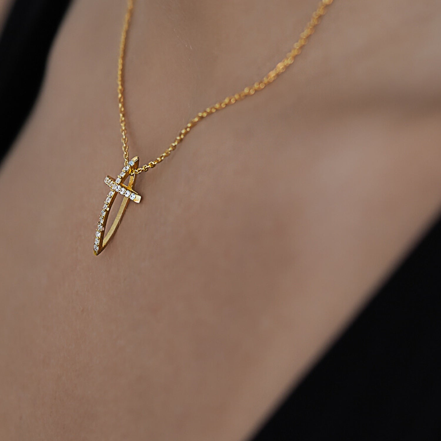 A model wearing the Unique Cross Diamond Necklace, radiating elegance and faith.