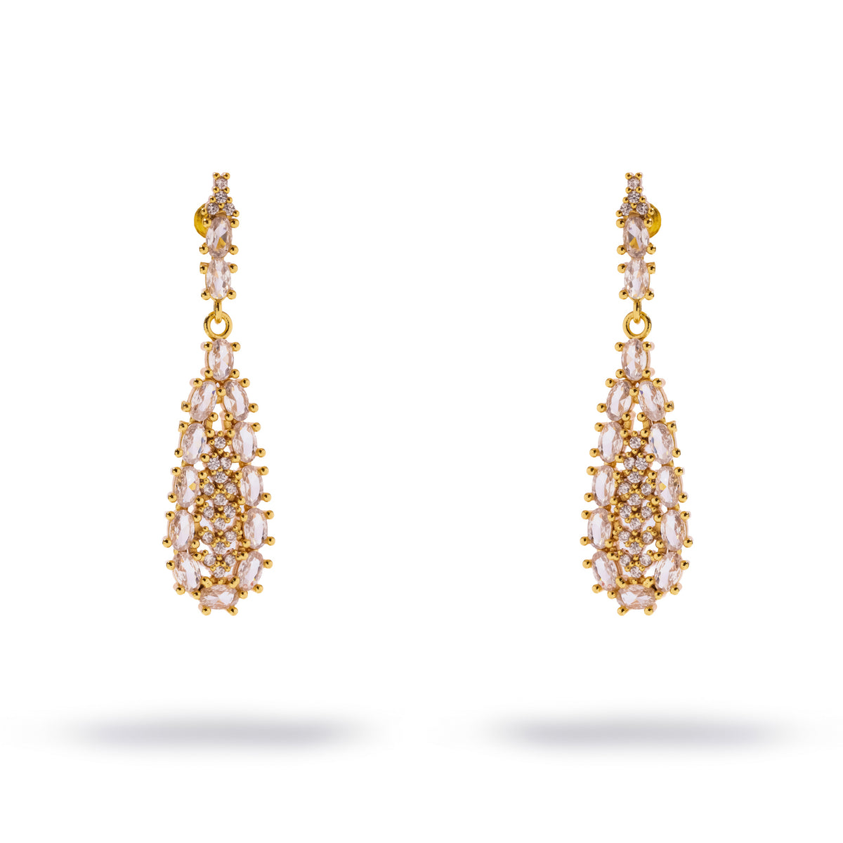 Pair of vintage zircon teardrop gold earrings shown upright against white, 2 inches long