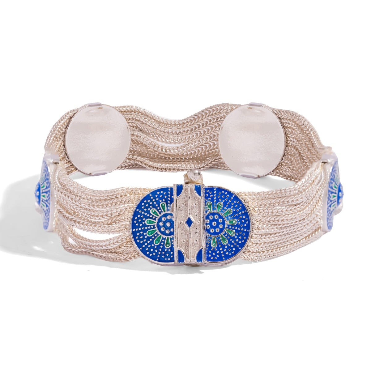 Wide woven silver bracelet closing on a cobalt blue and green enamel bloom medallion clasp