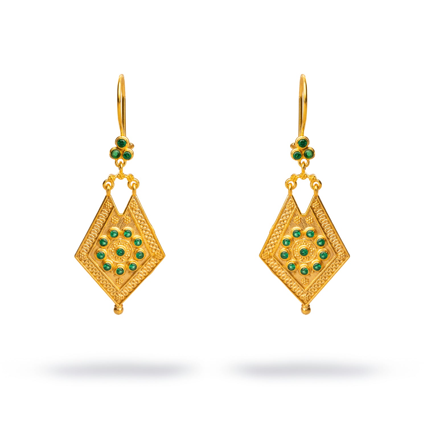 Elegant 24k gold-plated dangle earrings featuring intricate gold detailing and vibrant emerald stones, offering a vintage-inspired charm.
