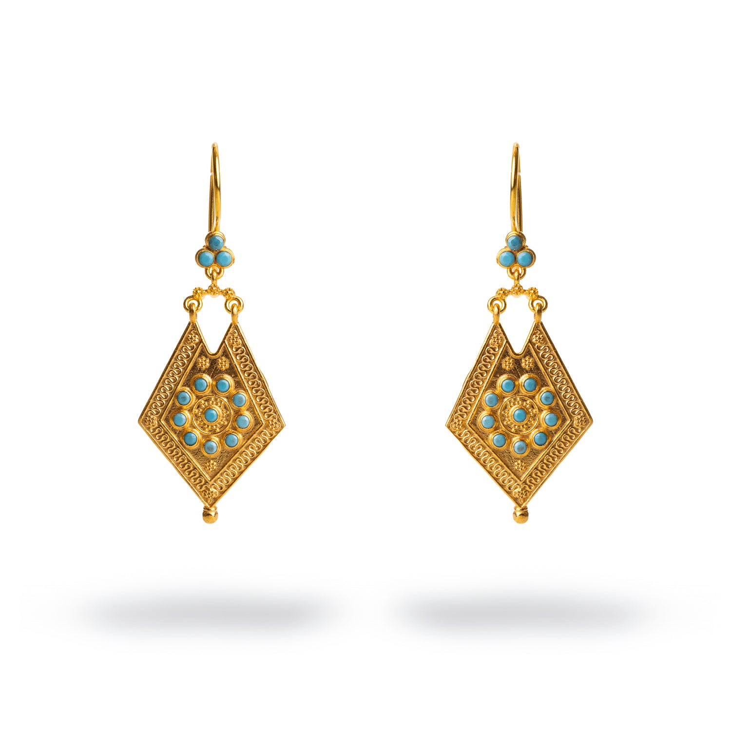 Exquisite 24k gold-plated dangle earrings featuring intricate gold accents and vibrant turquoise stones for a vintage-inspired design.
