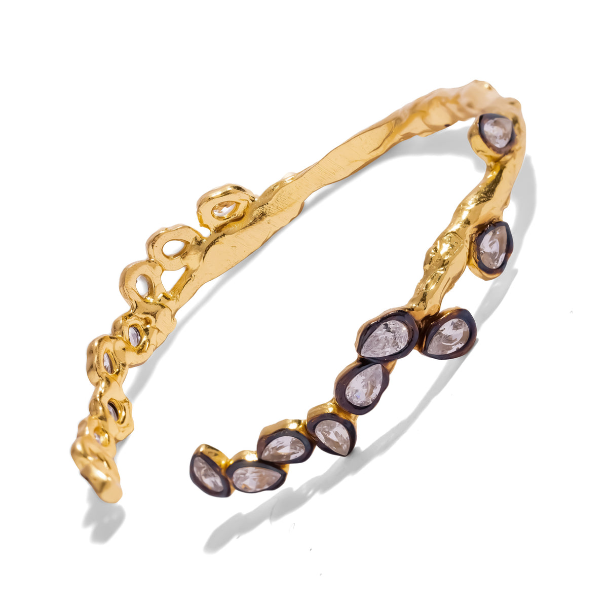 Vintage Style Teardrop Two Tone Gold Cuff Bracelet showing the organic textured gold band and stone clusters