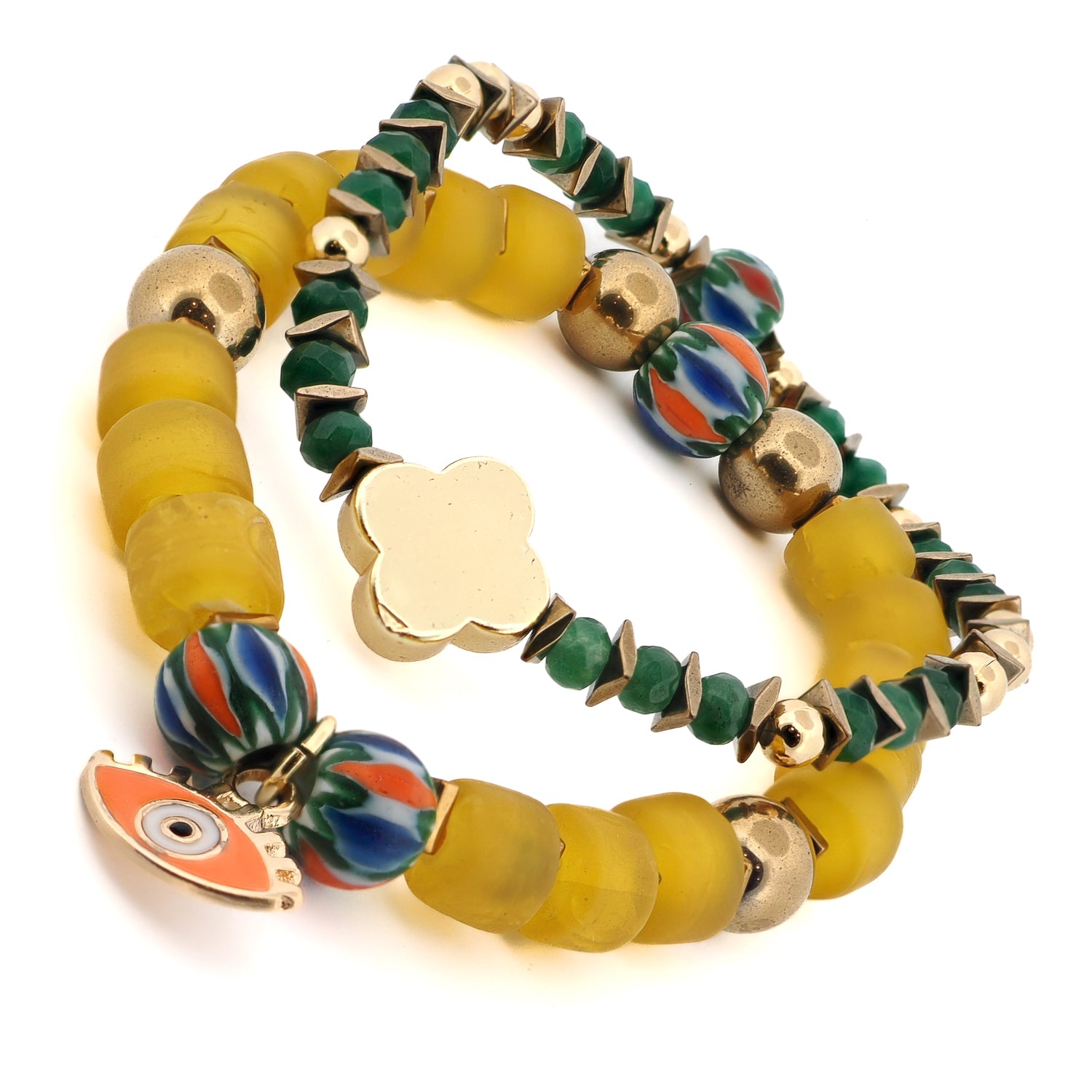 Close-up of African-style ceramic beads and gold flower detail on spiritual bracelet set.

