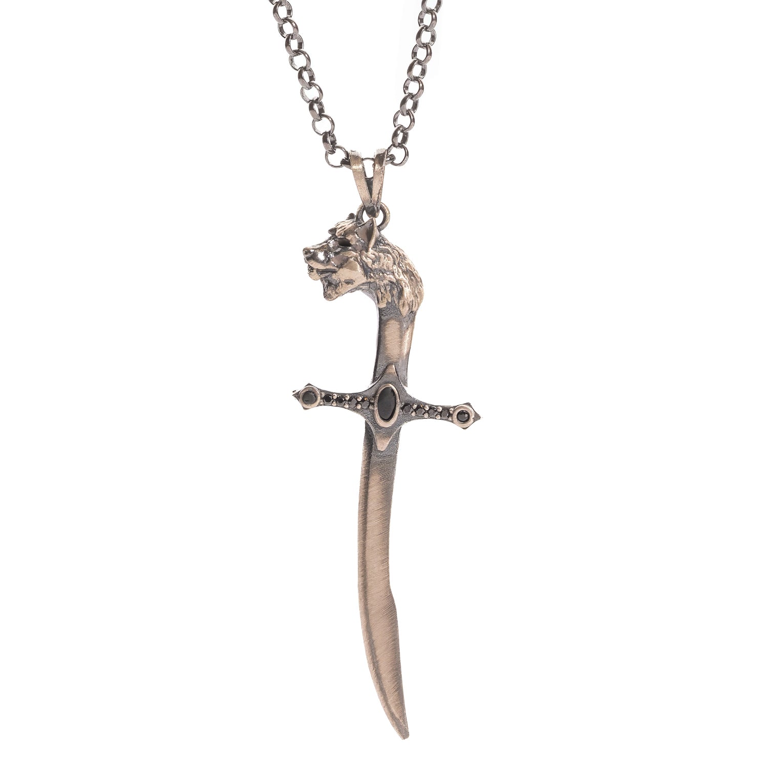 Close up of the wolf head pommel and black zircon set cross guard on the sterling silver sword