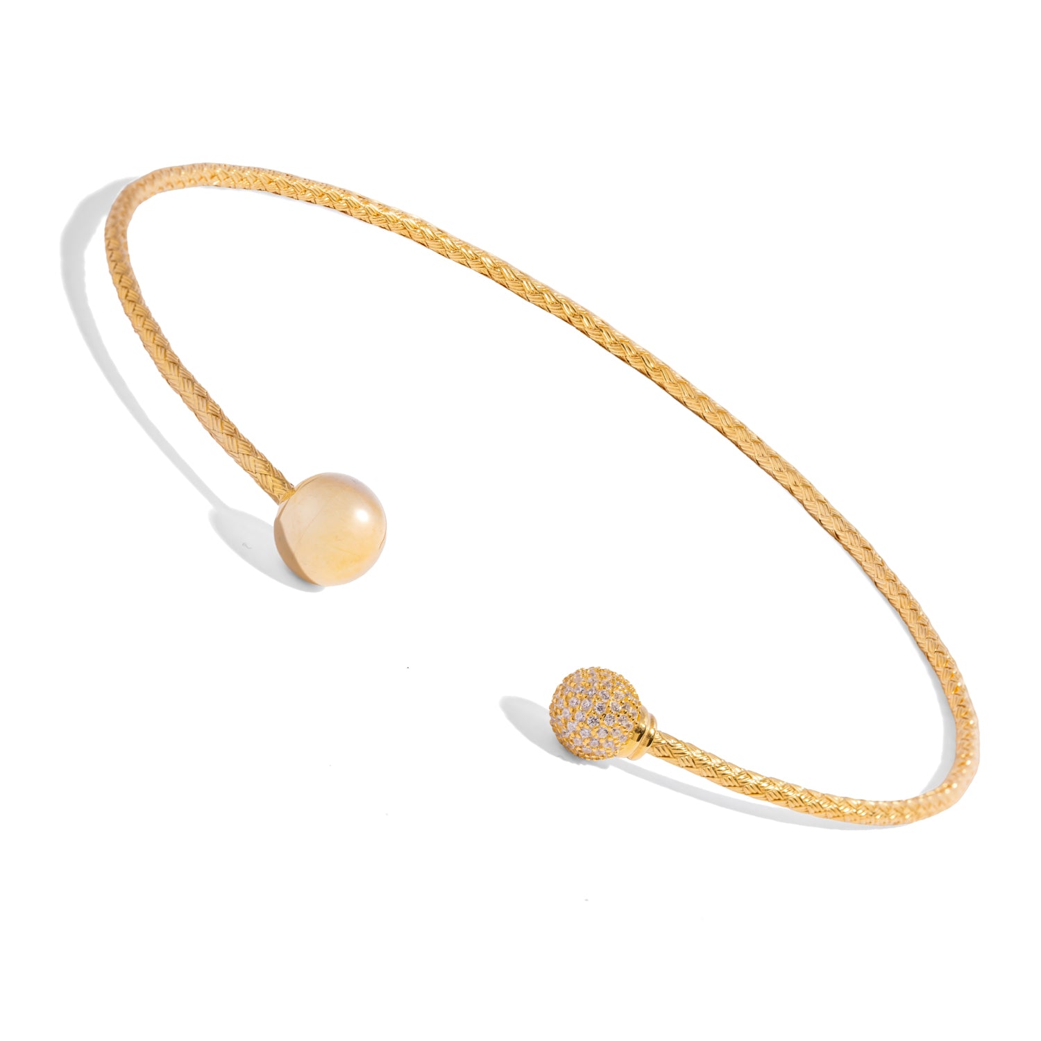Woven gold vermeil pave sphere choker necklace on white background showing open front design