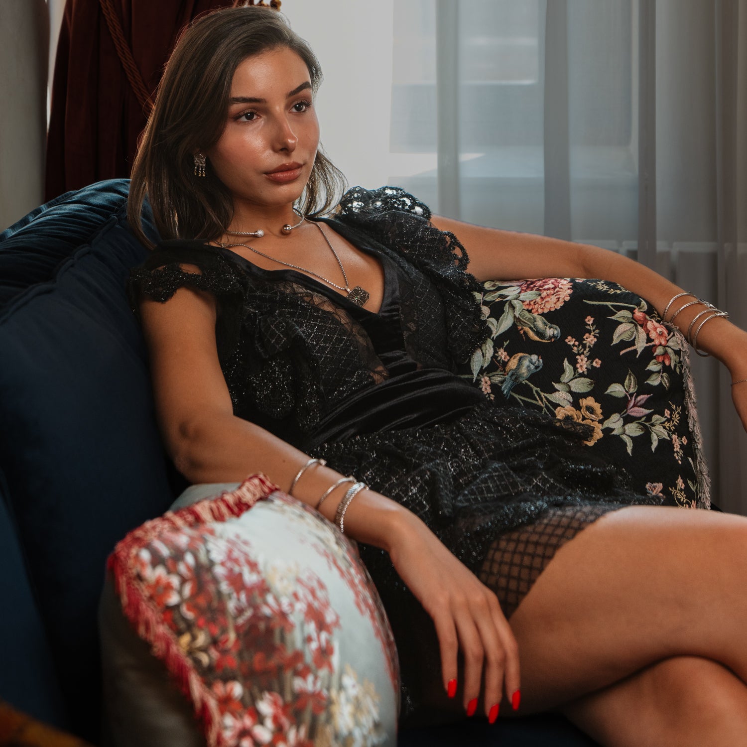 Model in black lace wearing a handmade sterling silver woven choker necklace