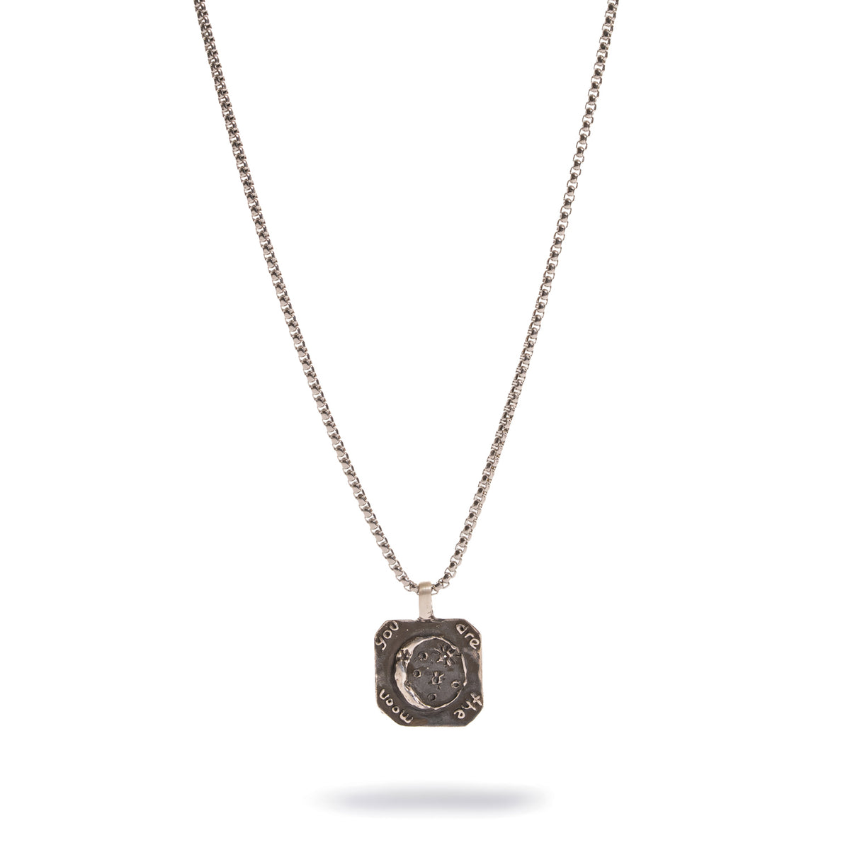 Full length view of the You Are The Moon Engraved Unisex Sterling Silver Pendant Necklace on its box chain