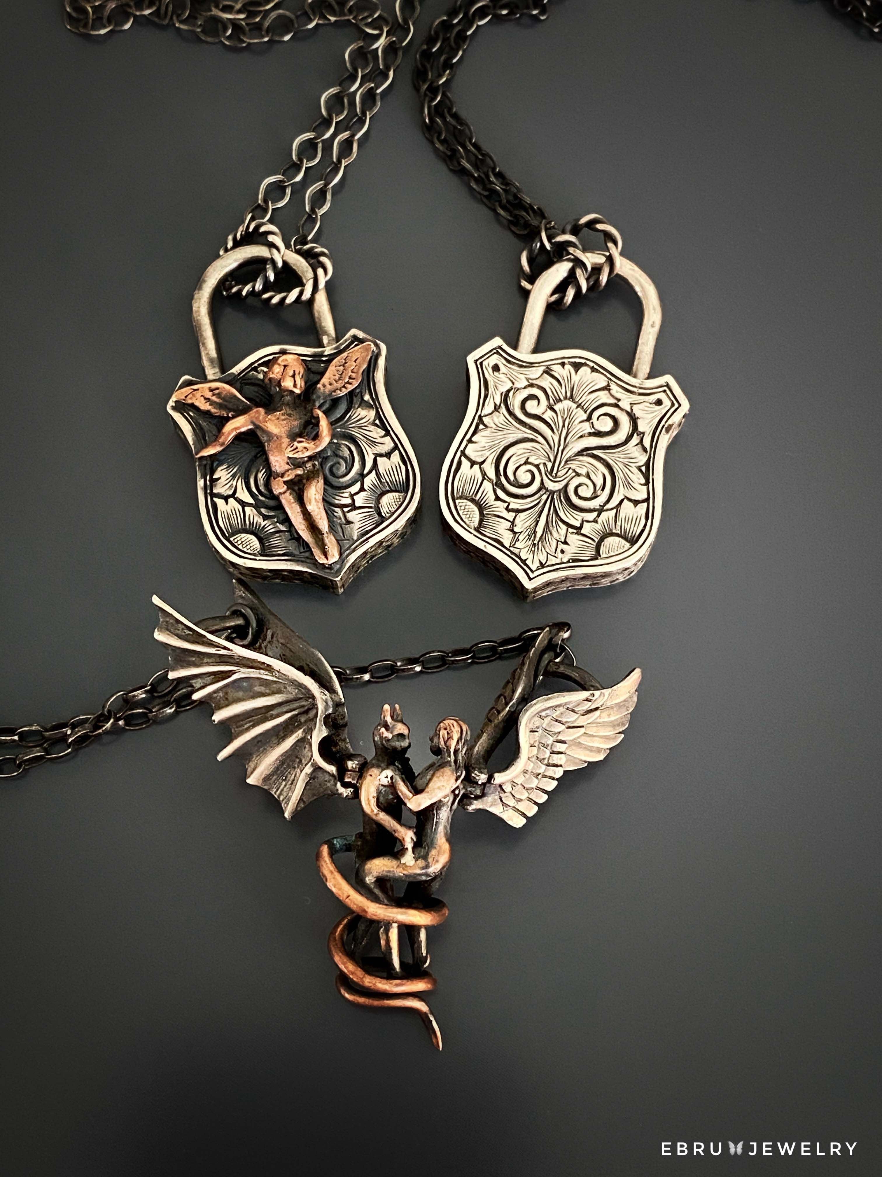 Layer the Angel Lock Necklace with other necklaces for a trendy look or wear it alone as a cherished and meaningful piece