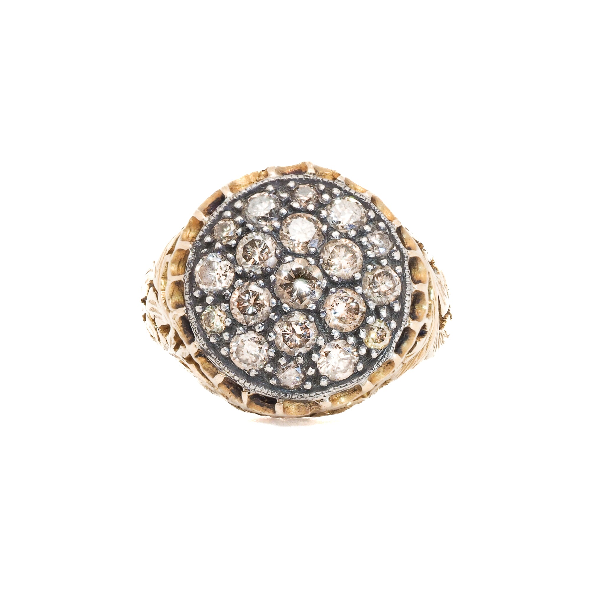 Close-up of Elegant Handcrafted Gold and Diamond Ring showcasing intricate details and sparkling brown diamonds.
