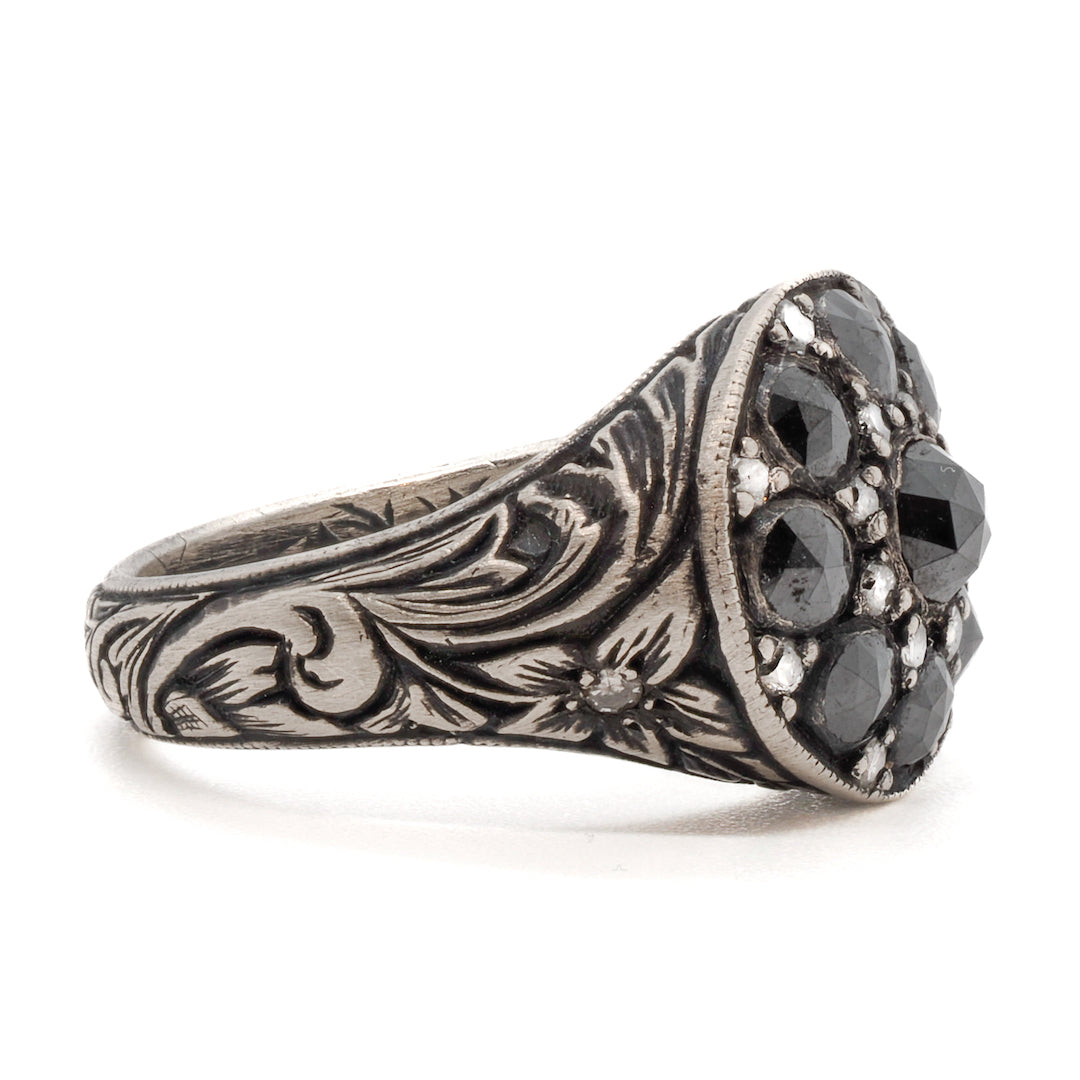 A closer look at the intricate hand engraving on the Black Rose Signet Ring
