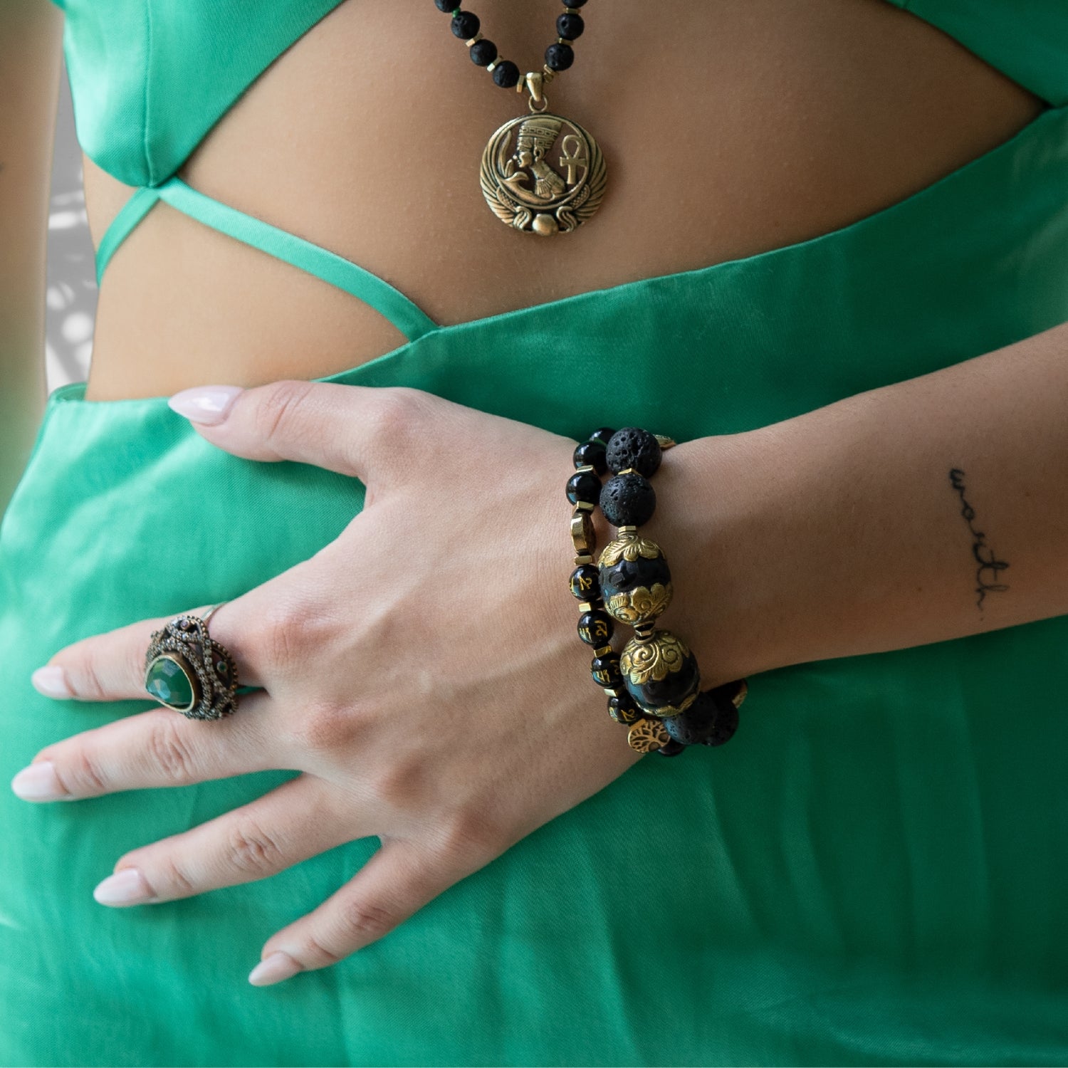 Hand model wearing Black Nepal Talisman Bracelet for Protection and Positive Energy.