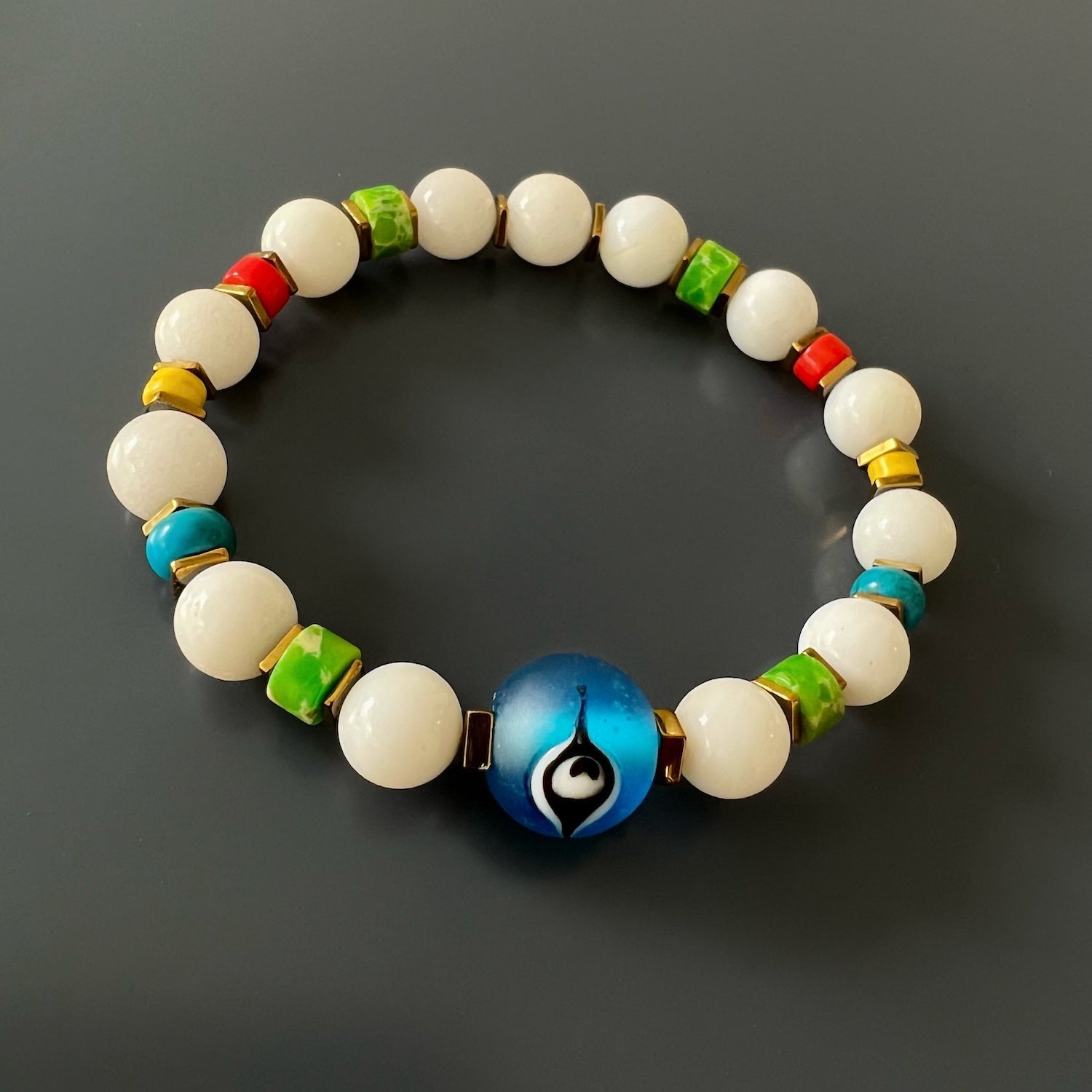 Layered Look: Blue Evil Eye Bracelet with Other Bracelets