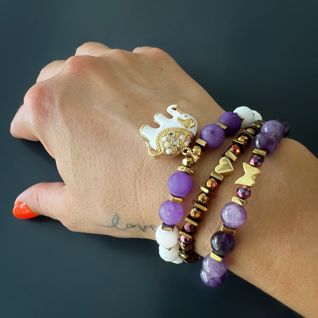 A unique and meaningful piece of jewelry, perfect for any occasion and outfit. Hand model wearing the Butterfly Love Amethyst Bracelet Set.