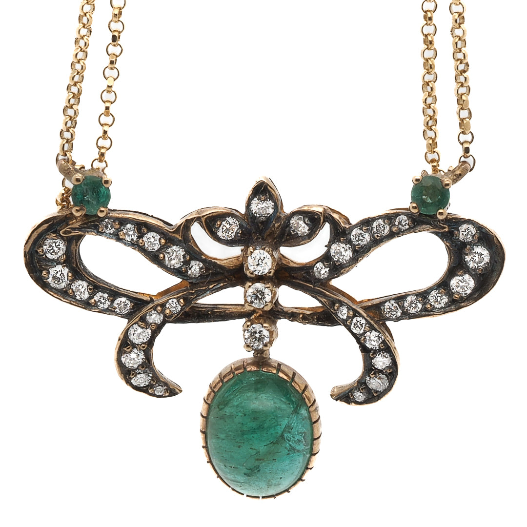Add a touch of elegance to your look with this handmade Cabochon Emerald Pendant Necklace from Ebru Jewelry.