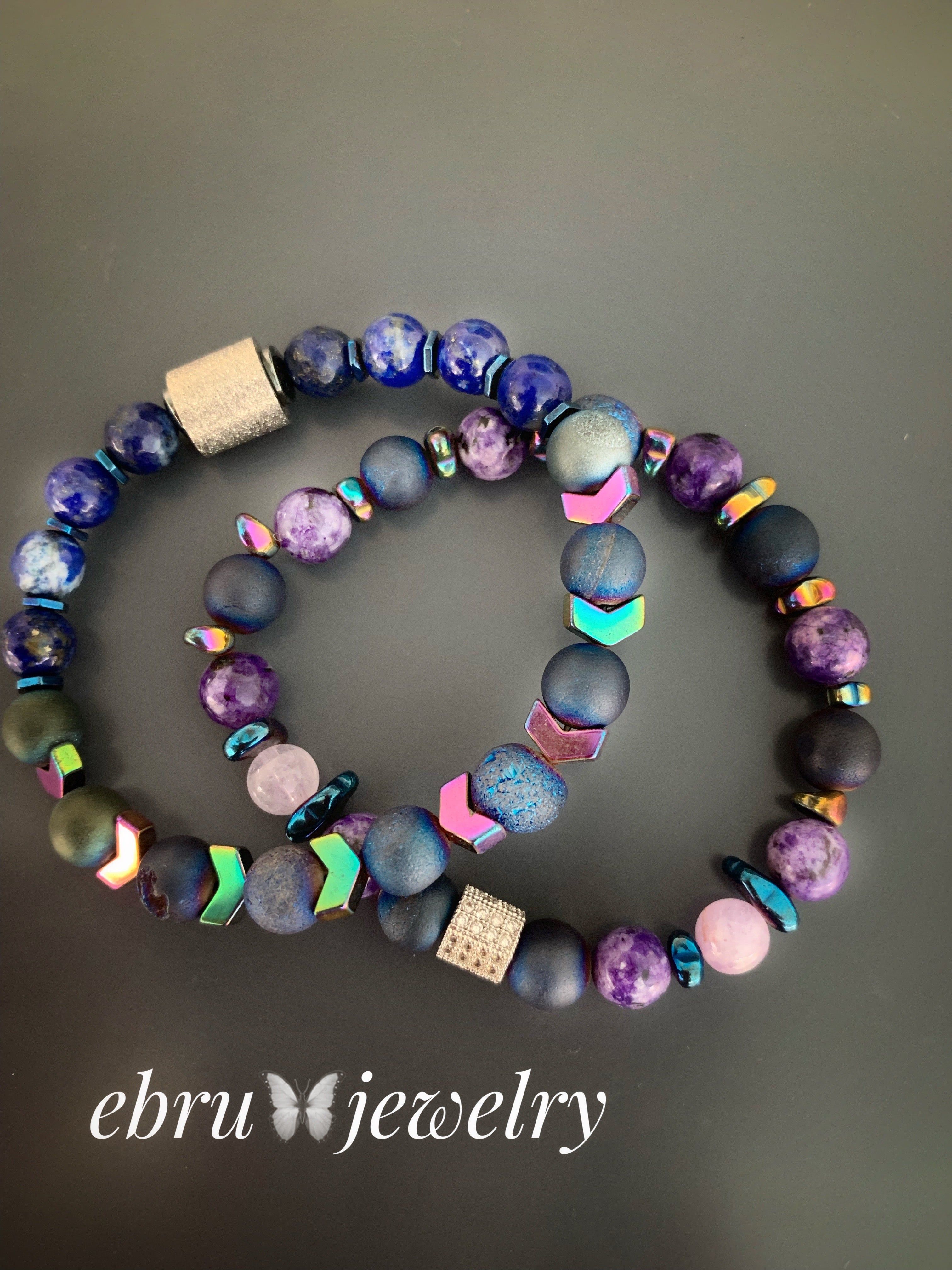 Discover the vibrant beauty of the Love Of Color Bracelets, featuring lapis lazuli, druzy agate, purple jade, and colorful hematite beads for a stylish and eye-catching look.