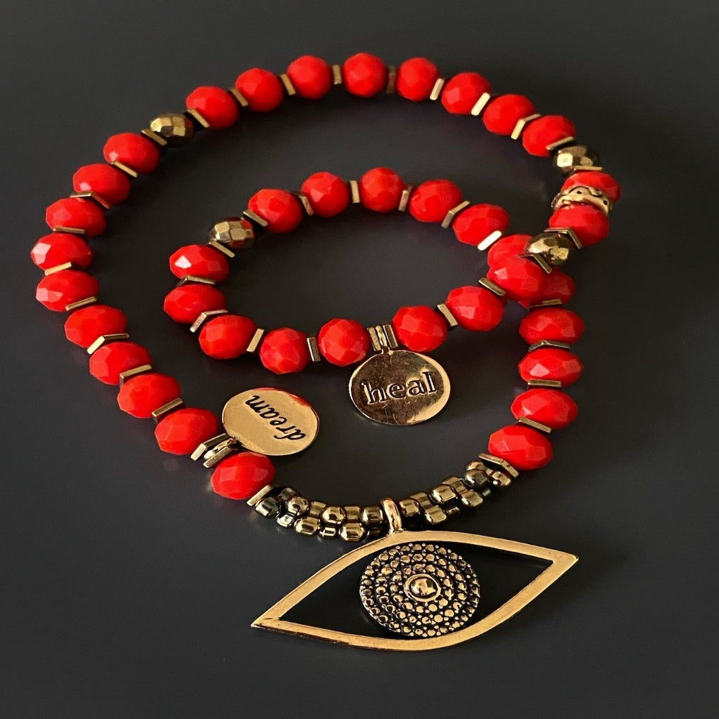 Evil Eye Protection Bracelet with Red Crystal Beads: The Evil Eye symbol and red color crystals come together in this bracelet to offer protection and positive energy.