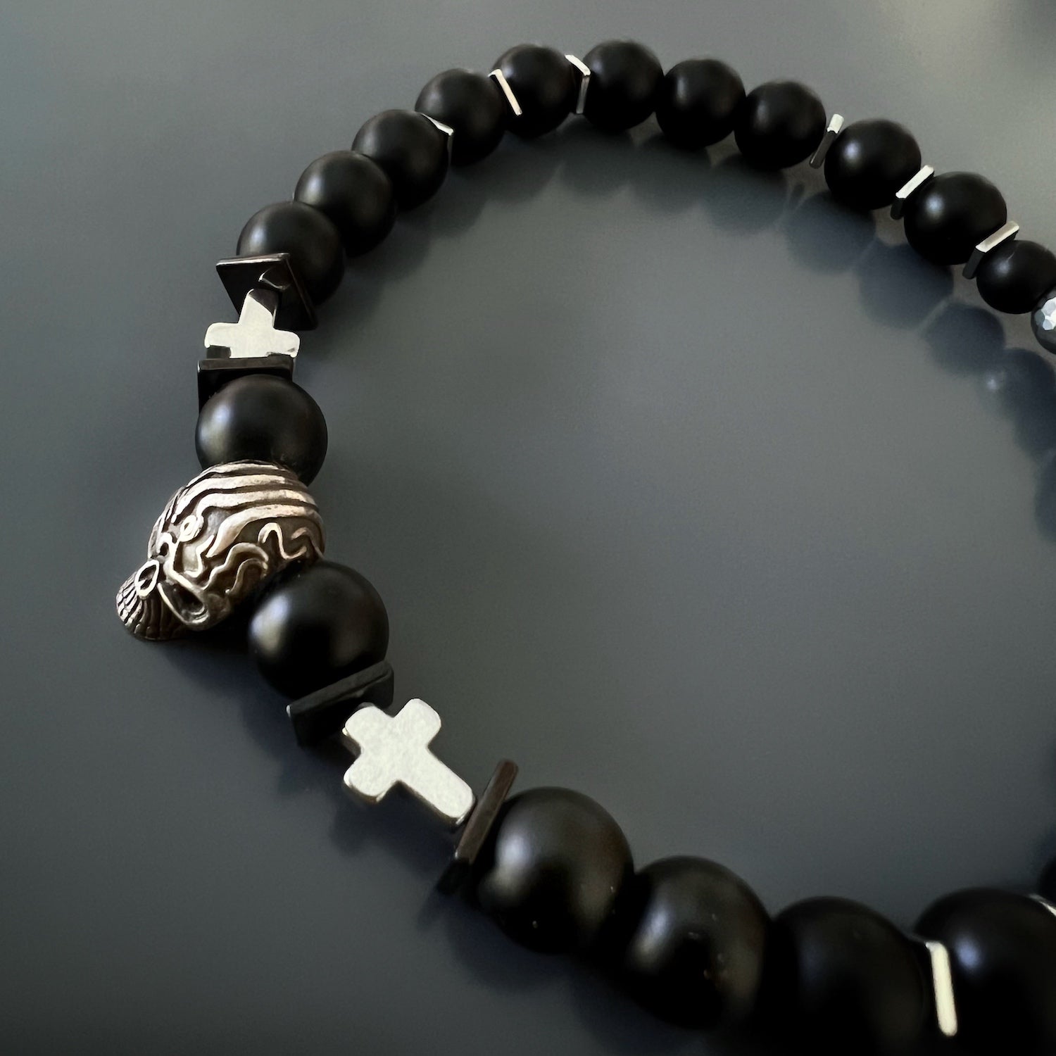 The Courage Onyx Skull Bracelet is a powerful symbol of transformation and resilience. 