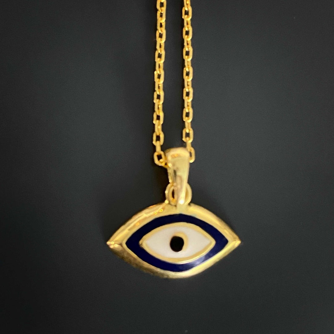 A close-up view of the Dainty Evil Eye Necklace showcasing the intricate details of the evil eye charm and the high-quality craftsmanship.