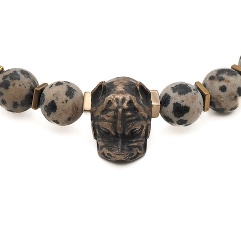 the Dalmatian Jasper Dog Bracelet, showcasing how it adds a touch of style and personality to the wrist while expressing a love for dogs.