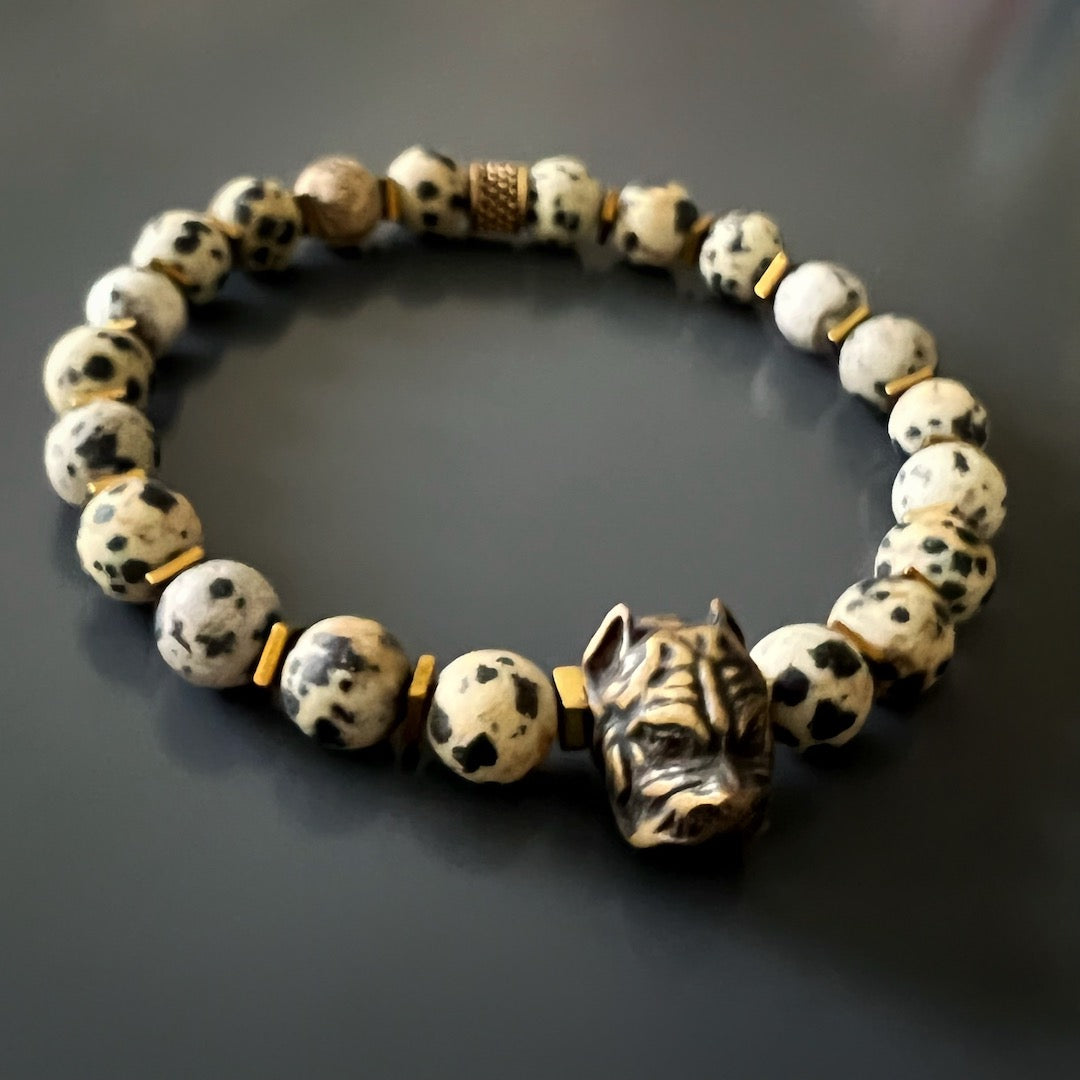 An image featuring the Dalmatian Jasper Dog Bracelet, emphasizing the nurturing energy of the dalmatian jasper stones and their ability to balance yin and yang energies.