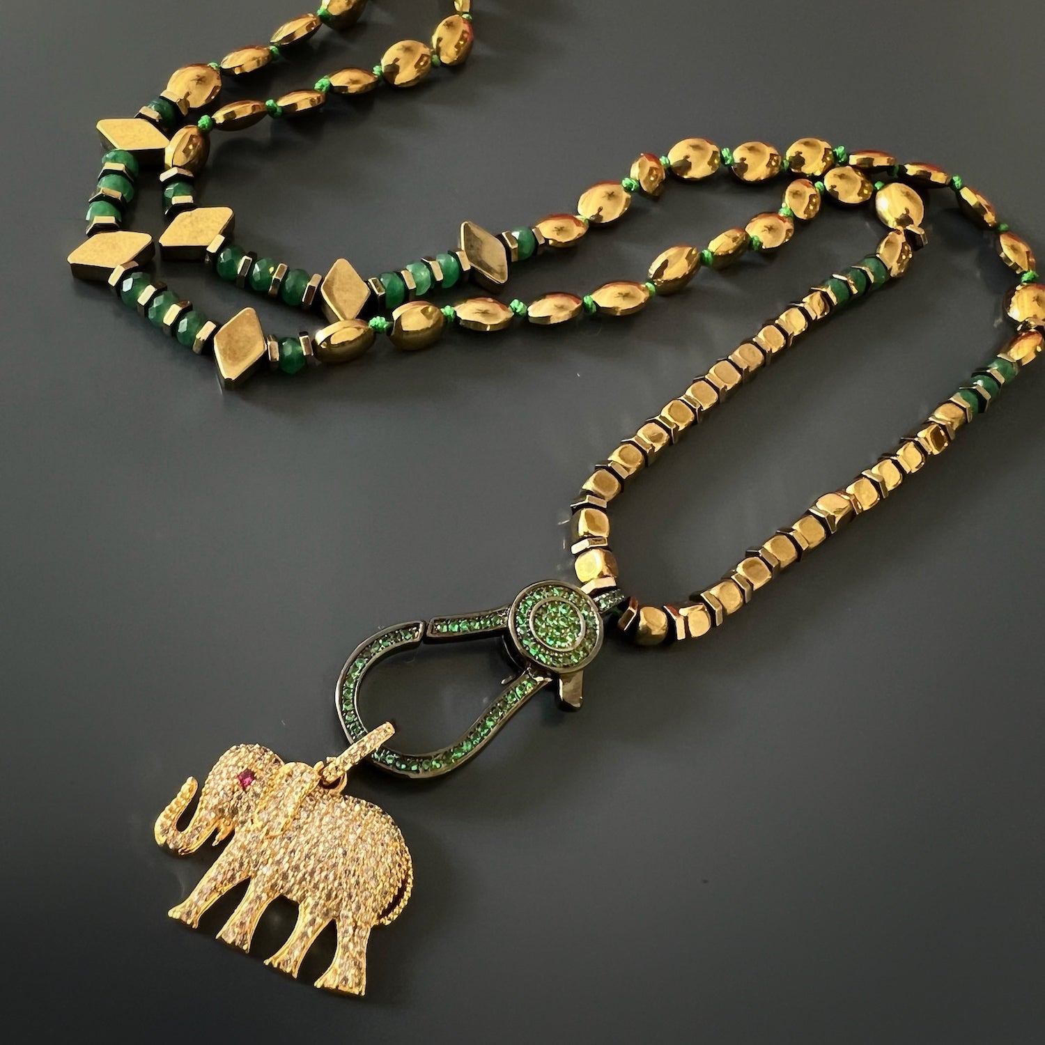 The diamond elephant golden necklace is a stunning piece of jewelry that is both elegant and unique. It's sure to make a statement and turn heads wherever you go.