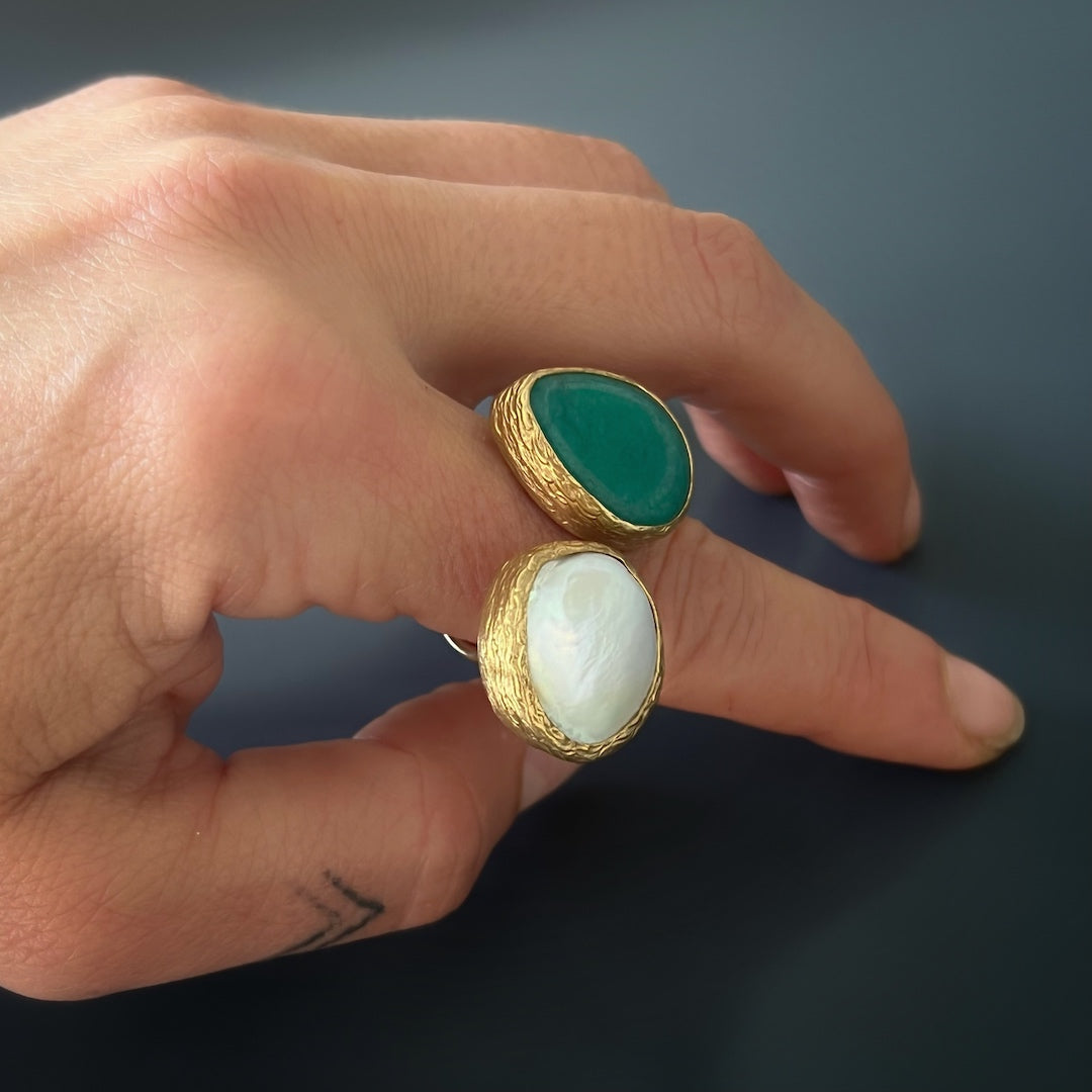 Stylish hand model wearing the versatile Double Gemstone Gaia Ring, a perfect addition to any outfit.