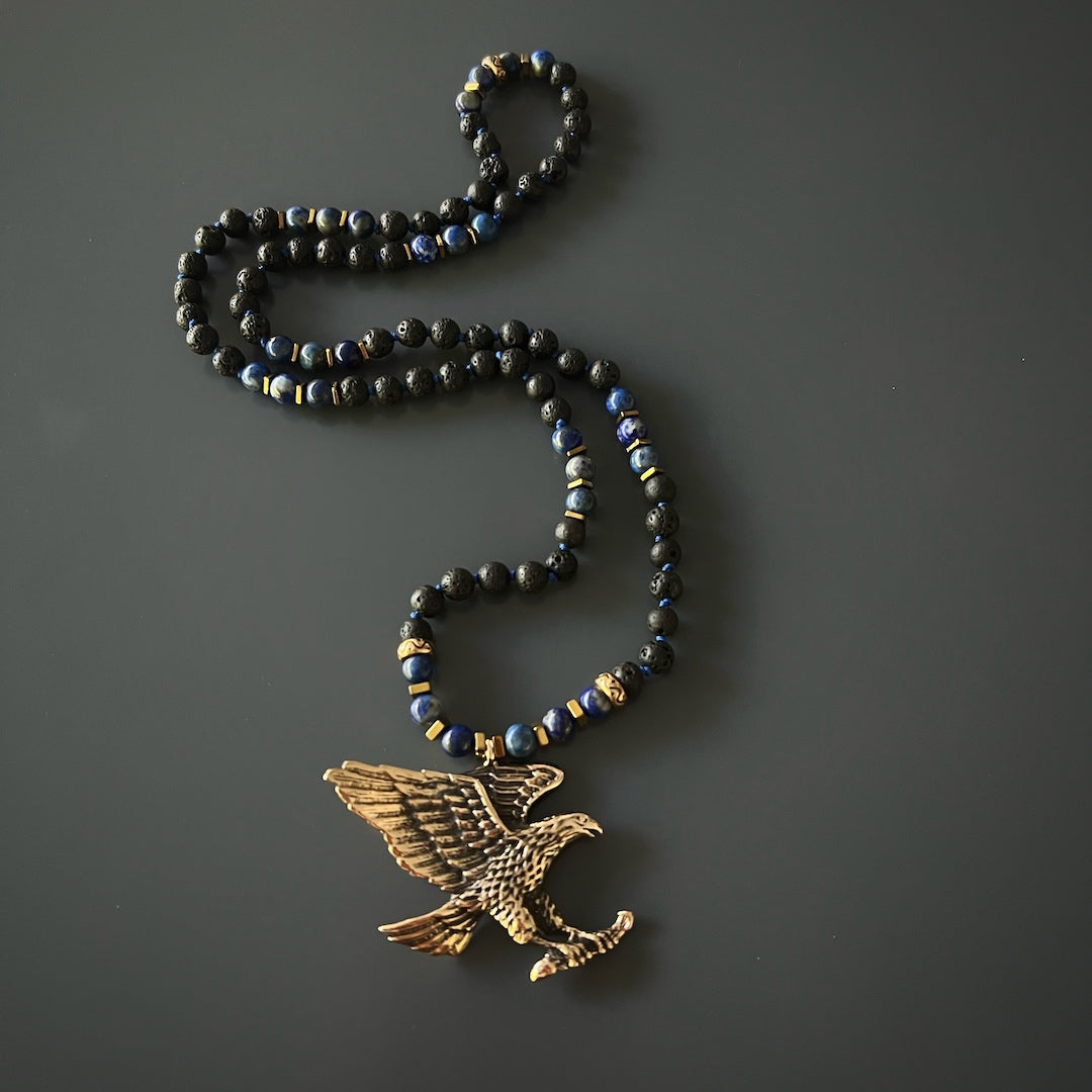 Bronze Eagle Pendant on a stunning Lava Rock and Lapis Lazuli beaded necklace, a powerful symbol of strength and guidance.