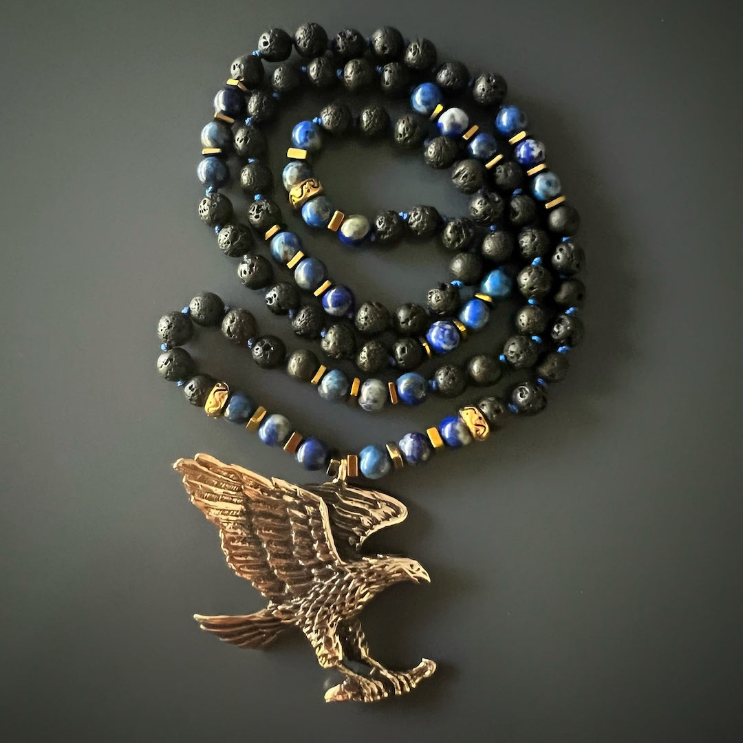 Lava Rock and Lapis Lazuli Eagle Necklace, handmade with care for a unique and meaningful accessory.
