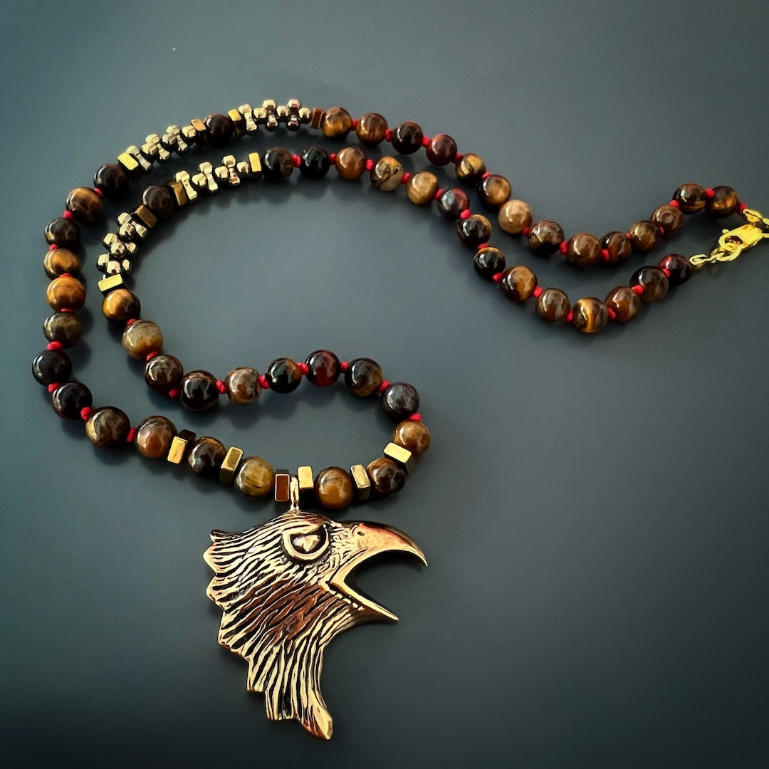Tiger&#39;s Eye Stone Necklace with Bronze Eagle Pendant, a powerful combination of protection and empowerment.