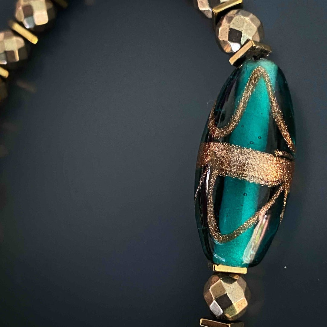 Elegant Bracelet featuring Faceted Hematite Stones and Ebru Jewelry Logo Bead, a symbol of quality craftsmanship.
