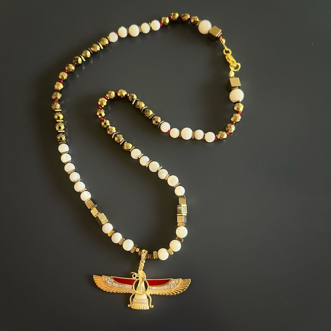 Symbolic Faravahar Necklace - Handmade jewelry with a 925 sterling silver Faravahar pendant, gold hematite and pearl stone beads for spiritual connection.