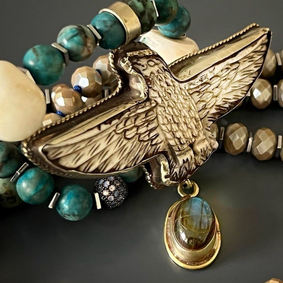 Spiritual Eagle Pendant Necklace - Unique accessory featuring turquoise, crystal beads, and a hand-carved eagle pendant symbolizing strength and hope.