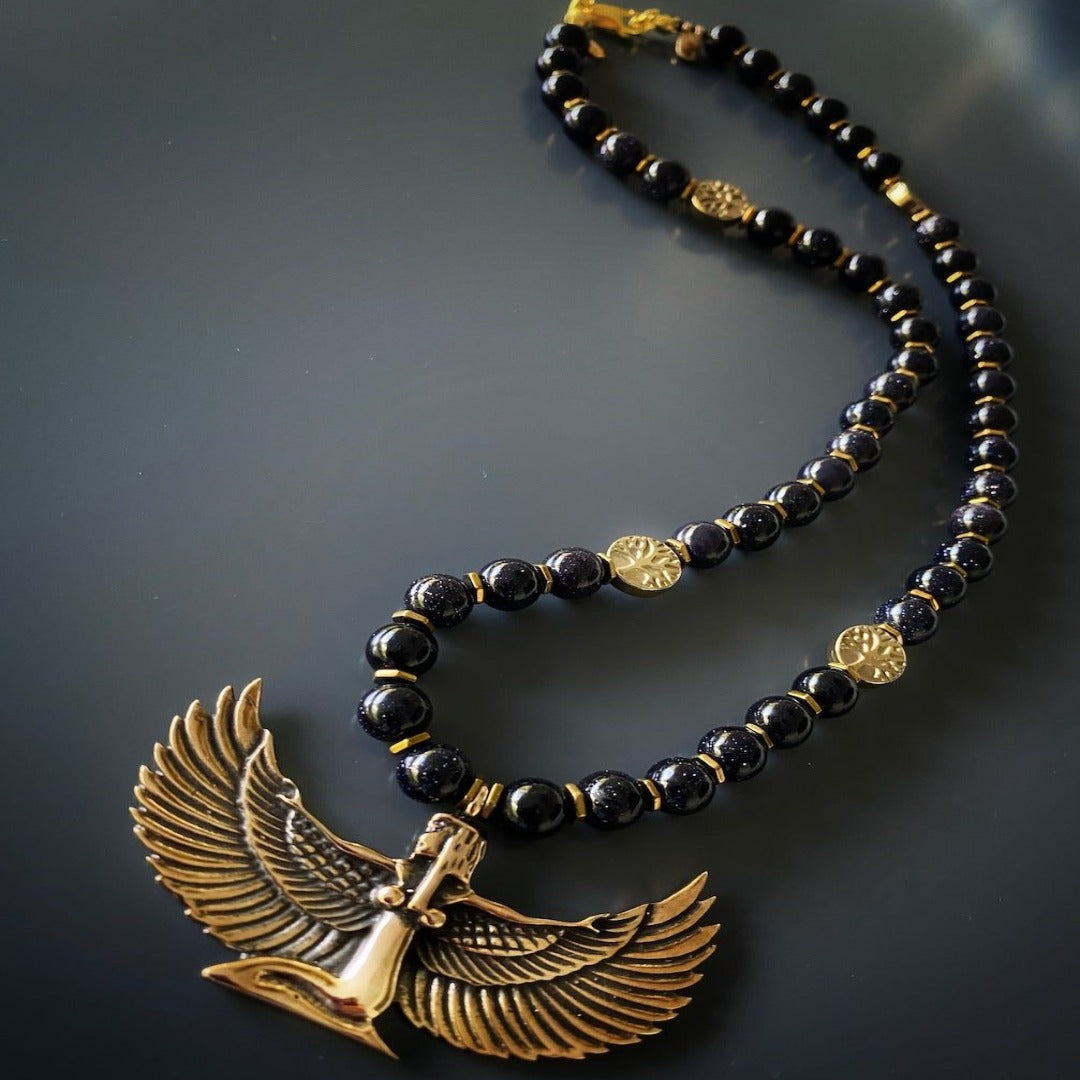 Handmade Necklace with Gold Hematite Tree of Life Beads and Goddess Isis Pendant, a stunning and meaningful accessory.