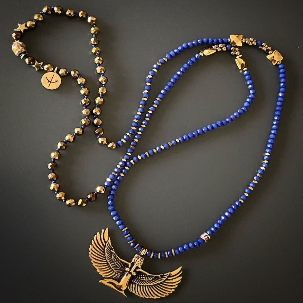 Handmade necklace adorned with a beautiful Goddess Isis pendant and blue crystal beads, representing strength and healing energy.