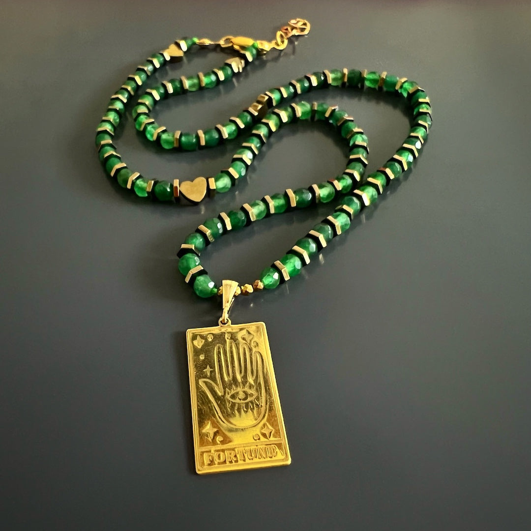 Handcrafted Jade Stone Necklace - An image showcasing the meticulous craftsmanship of the Good Fortune Tarot Necklace, highlighting the smooth and vibrant green jade stone beads.