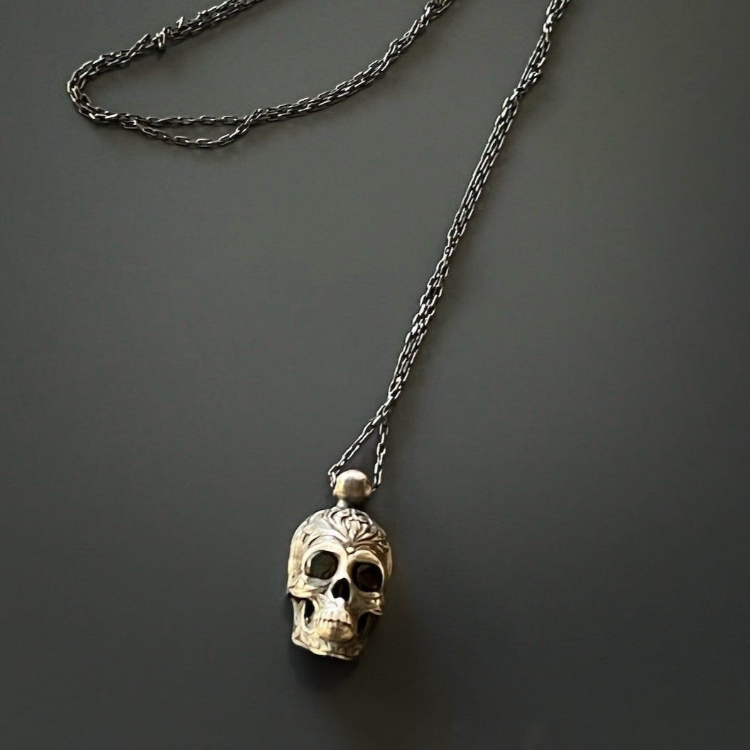 Intricate Gothic Silver Skull Necklace crafted from high-quality sterling silver and adorned with Swarovski crystals