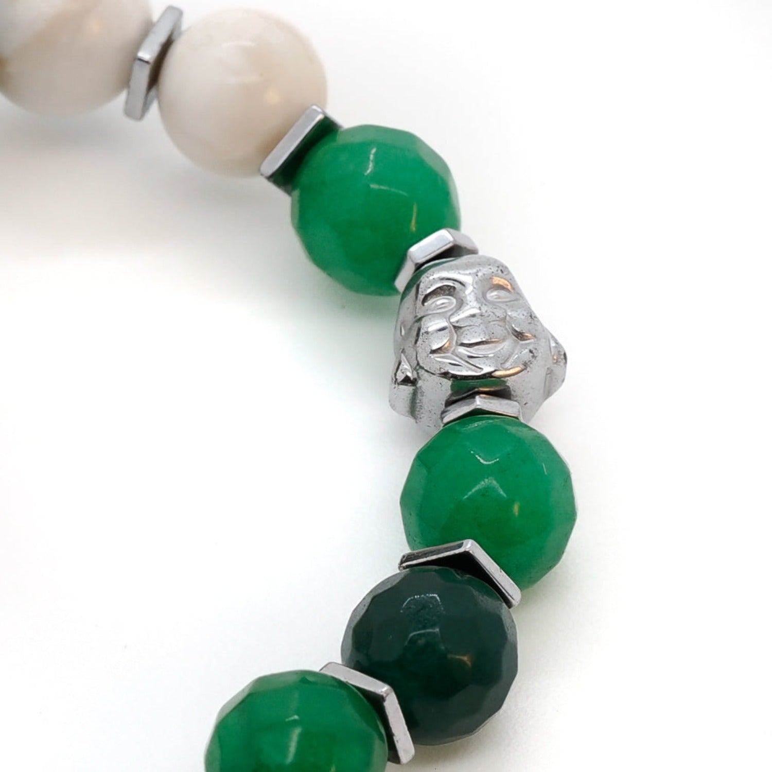Green Buddha Bracelet adorned with a striking Handmade Nepal Green bead, African green glass bead, and silver color Hematite spacers, creating a harmonious blend of cultural inspiration and natural materials.