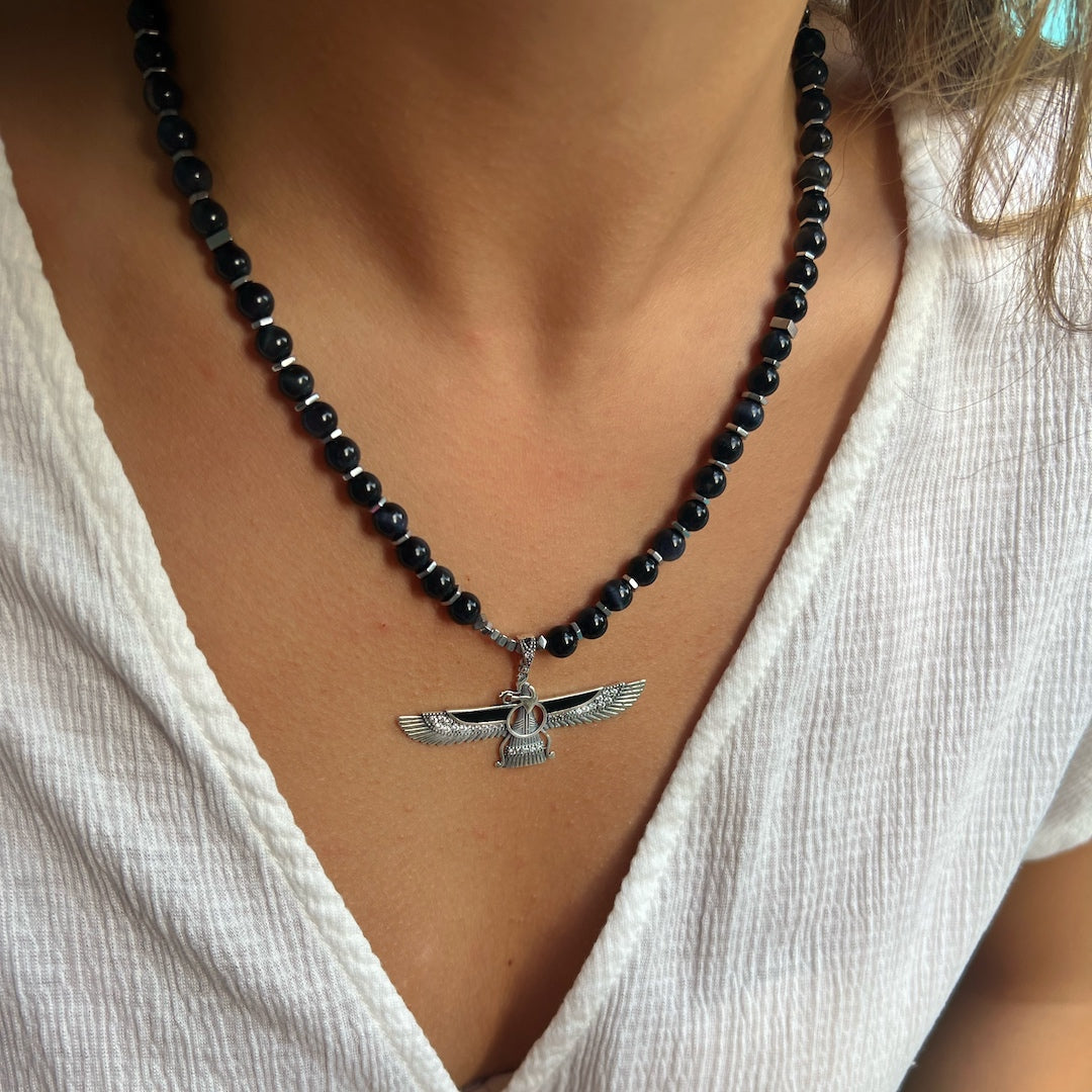 Symbolic Style - The Model Exudes Elegance with the Handmade Faravahar Pendant Necklace.