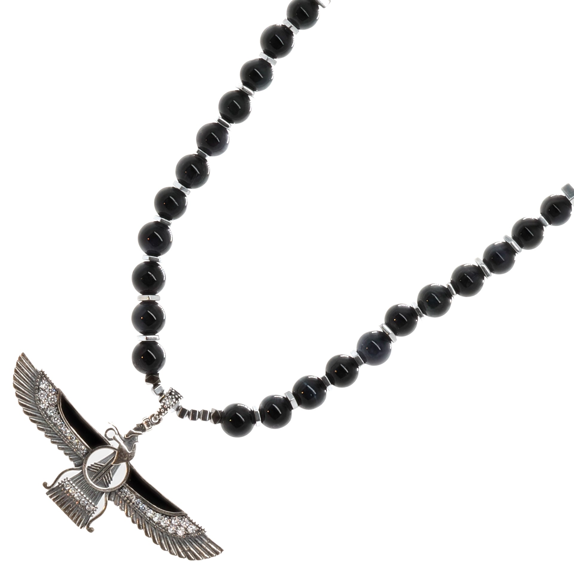 Empowering Presence - The Tourmaline Faravahar Necklace Reflects Confidence and Positivity.