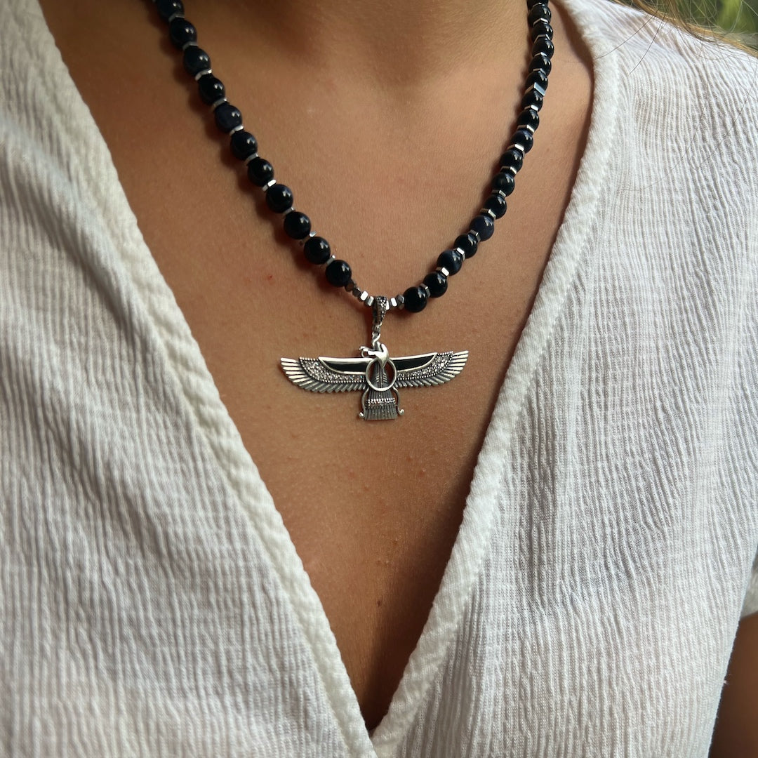 Confident Beauty - Our model showcases the Tourmaline Faravahar Necklace with Grace.