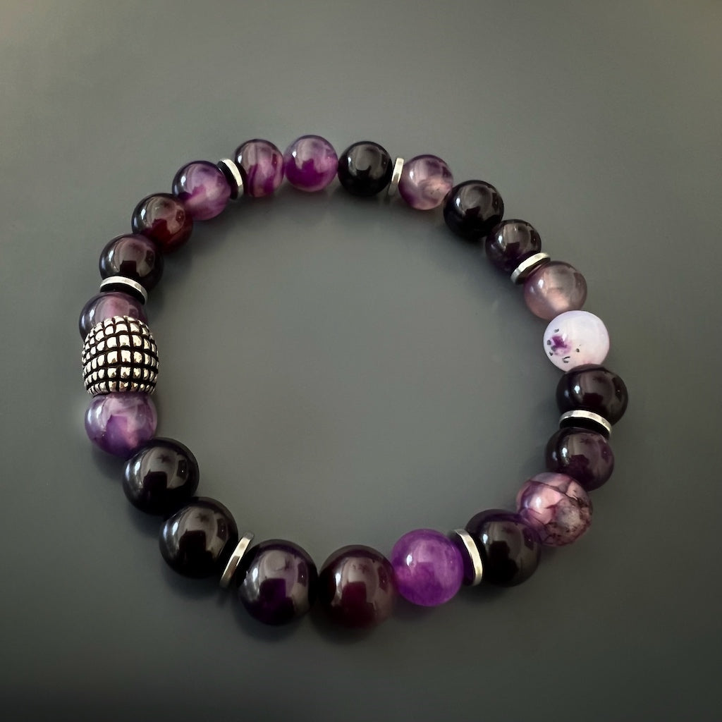 Close-up of the Amethyst stones and silver hematite spacers on the bracelet.