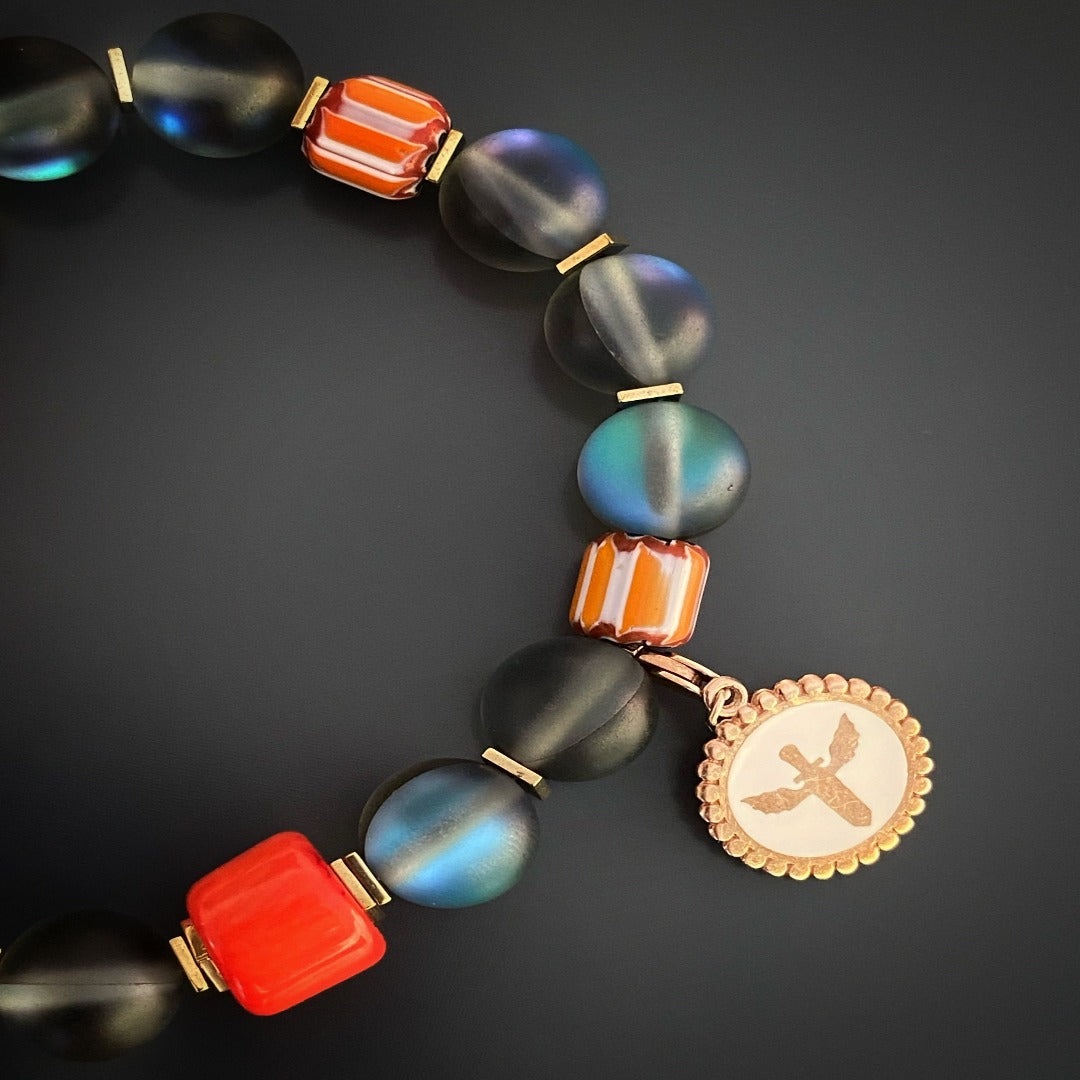Beautifully crafted Bracelet with a mix of natural stones and gold-colored spacers.